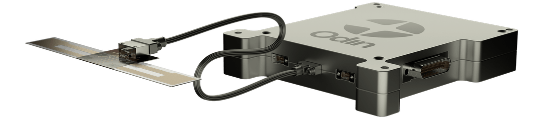 ODIN Black Box connected by cables to a flexible Nano Sensor strip